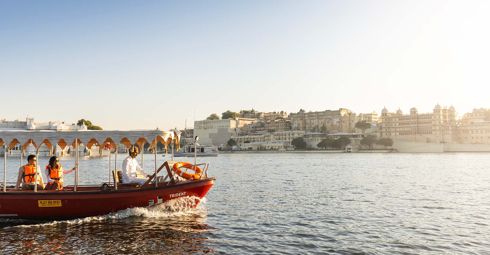 Romantic boat ride experience on Lake Pichola from Trident Udaipur, a 5 star hotel in Udaipur.